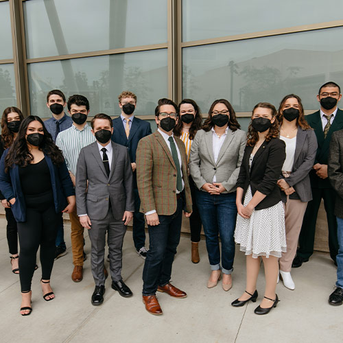 Forensics team posing in front of the BMC